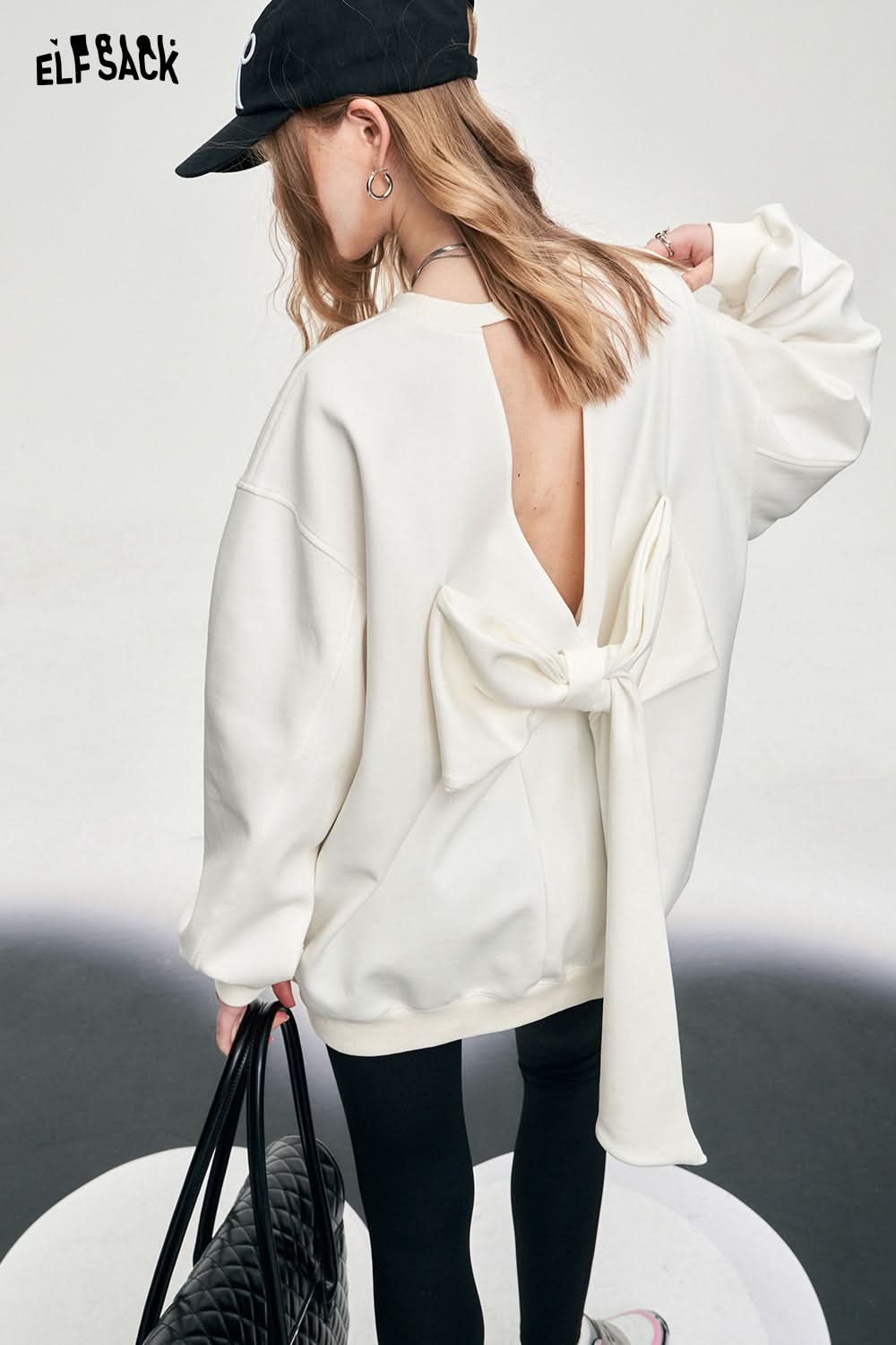 ELFSACK backless white large bow alphabet pringitng women's t-shirt long sleeve crew neck sweet office style loose top