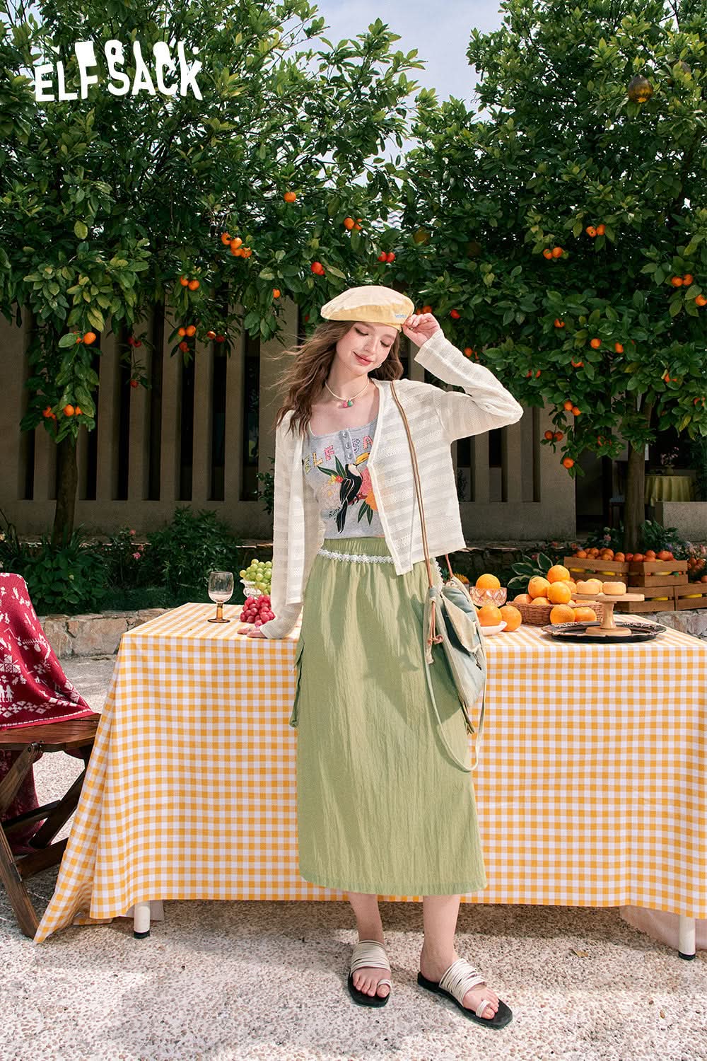 ELFSACK White V-neck hollow knitted stripes translucent buttons all-match light air-conditioning cardigan