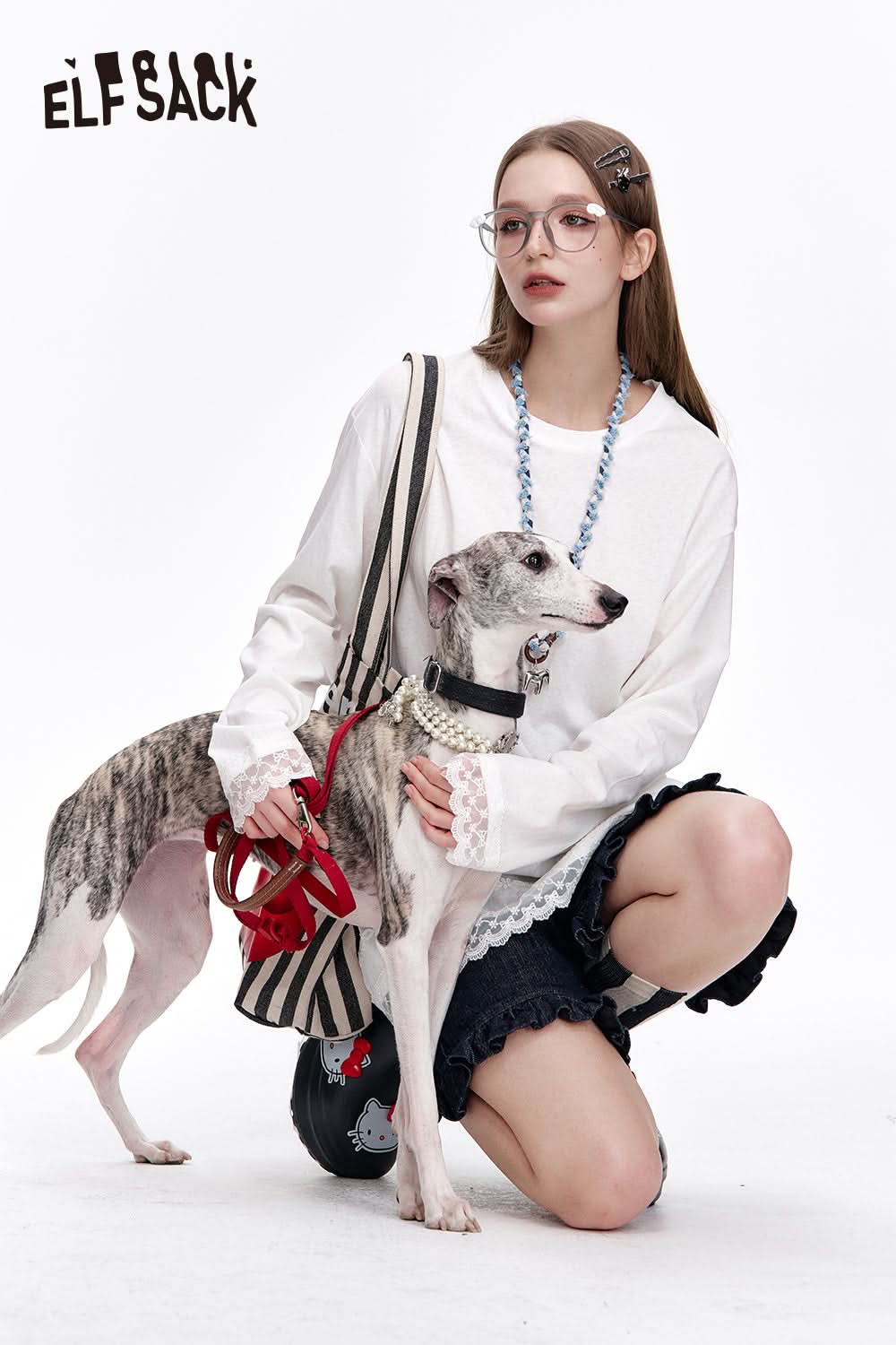 ELFSACK Sweet White Lace Stitching O-neck Long Sleeve T-shirt Women's Loose Casual Top