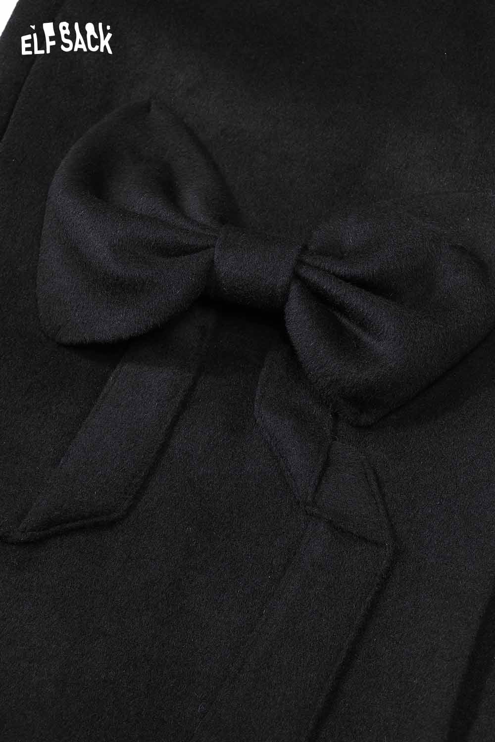 ELFSACK minimalist long coat for women featuring a stylish bow detail on a sleek black fabric