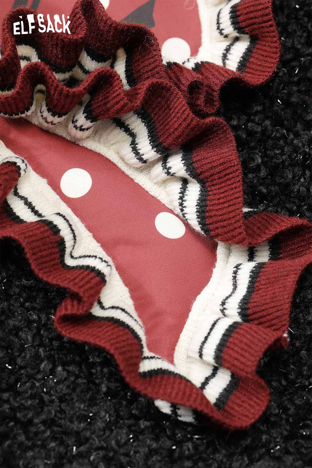 Detail of ELFSACK 3D bow glitter plush jacket with ruffled edge and polka dot design