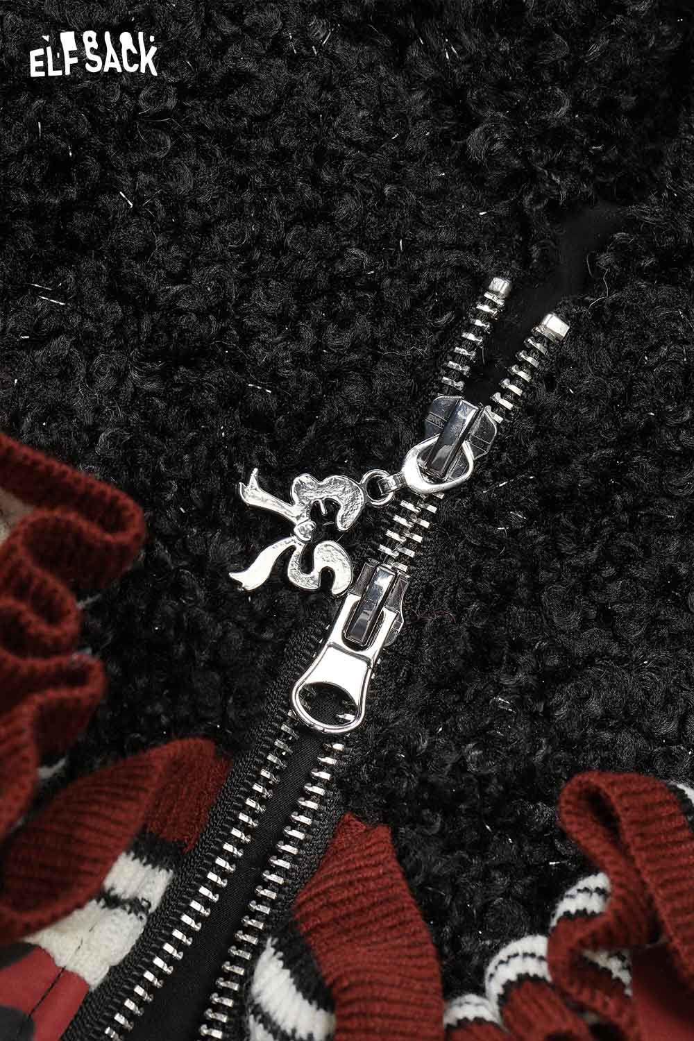 Close-up of ELFSACK 3D bow glitter plush jacket zipper detail with fun charm and ruffled design