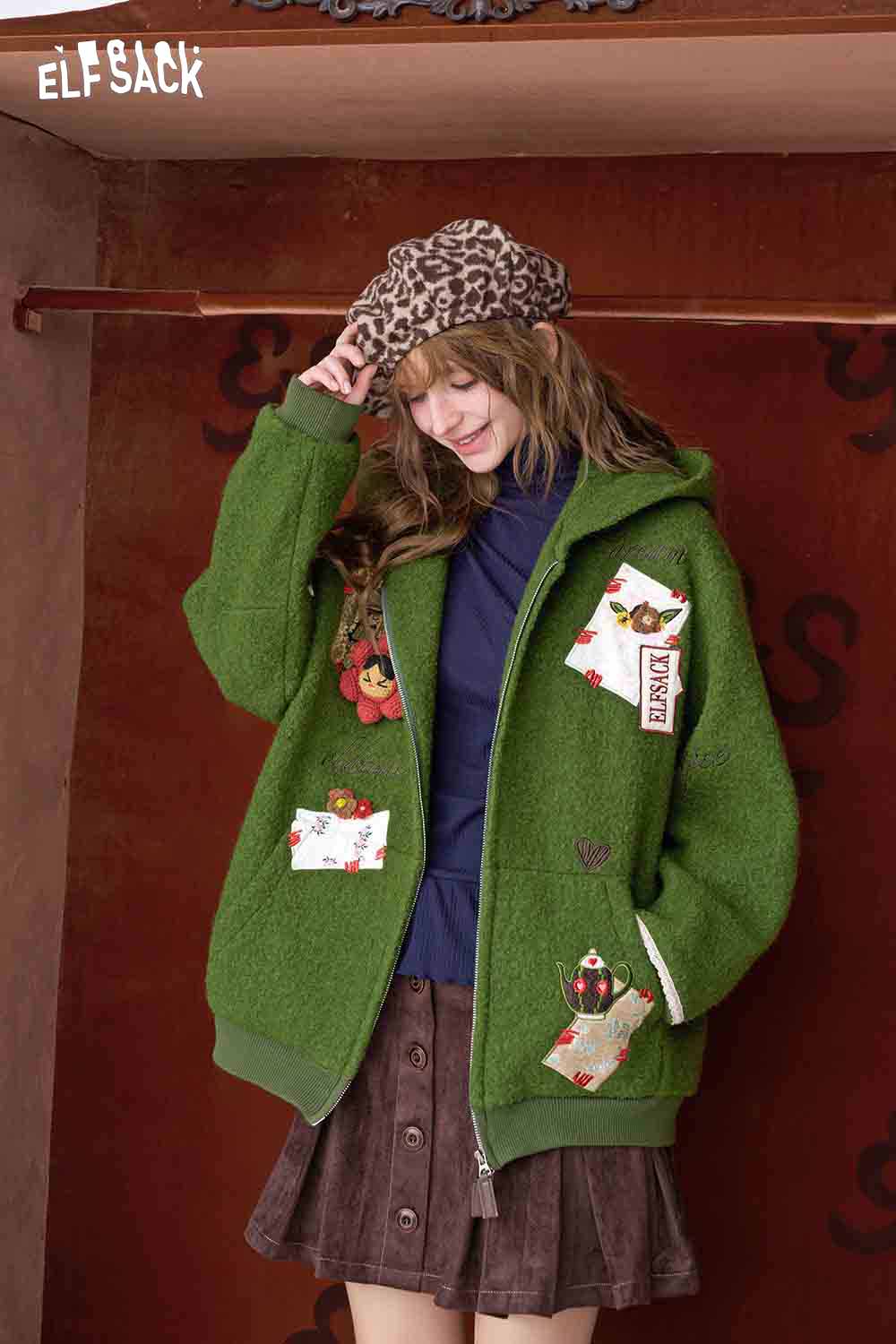 ELFSACK 3D embellished hooded coat for women in green with unique patches and cozy design