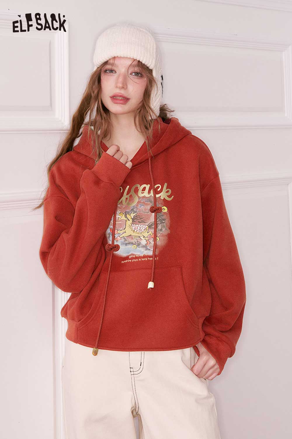ELFSACK animal cartoon hooded sweatshirt in rust color with playful graphic design and cozy fit