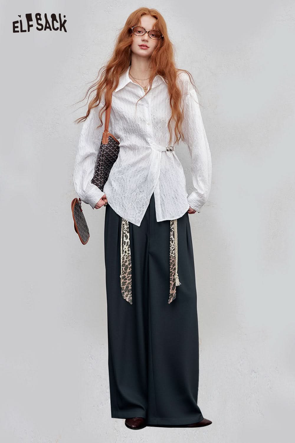 ELFSACK animal print wide leg trousers styled with a white shirt for a chic casual look