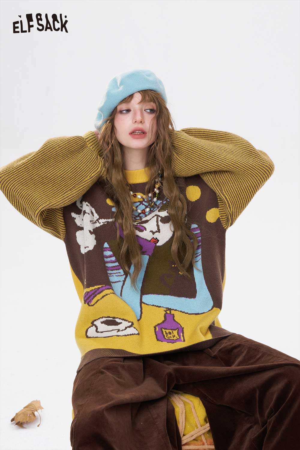Artistic graphic sweater for women by ELFSACK featuring vibrant colors and a unique design