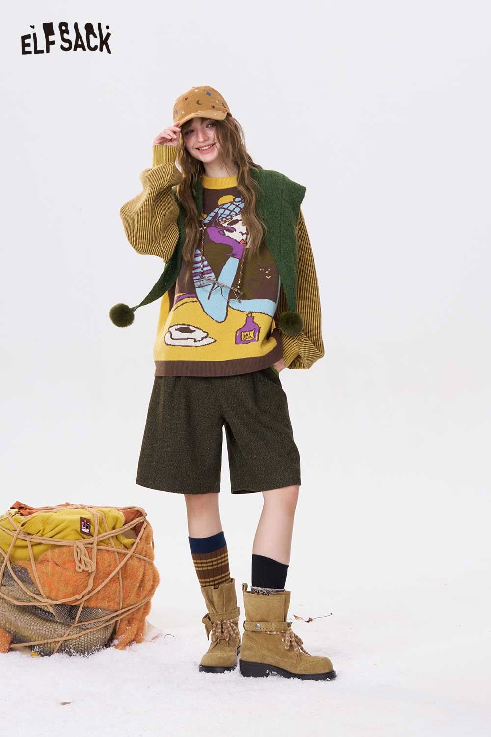 ELFSACK artistic graphic sweater for women featuring vibrant colors and fun illustrations, perfect for casual wear