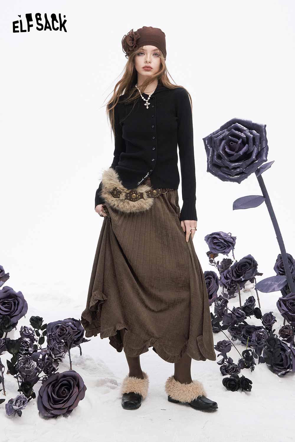 ELFSACK Asymmetric flounce hem skirt in brown paired with a black cardigan and accessories