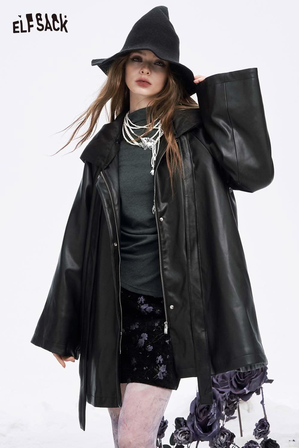 ELFSACK asymmetric hem long sleeve tshirt styled under a black leather coat for a chic look