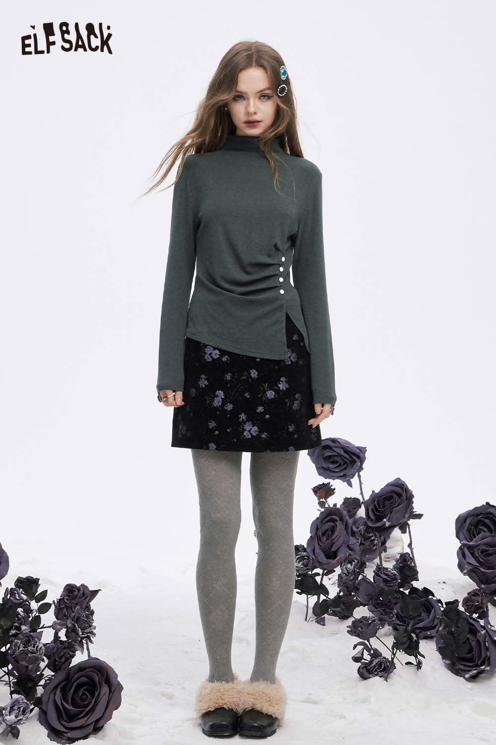 ELFSACK asymmetric hem long sleeve tshirt in green, styled with floral skirt and gray tights