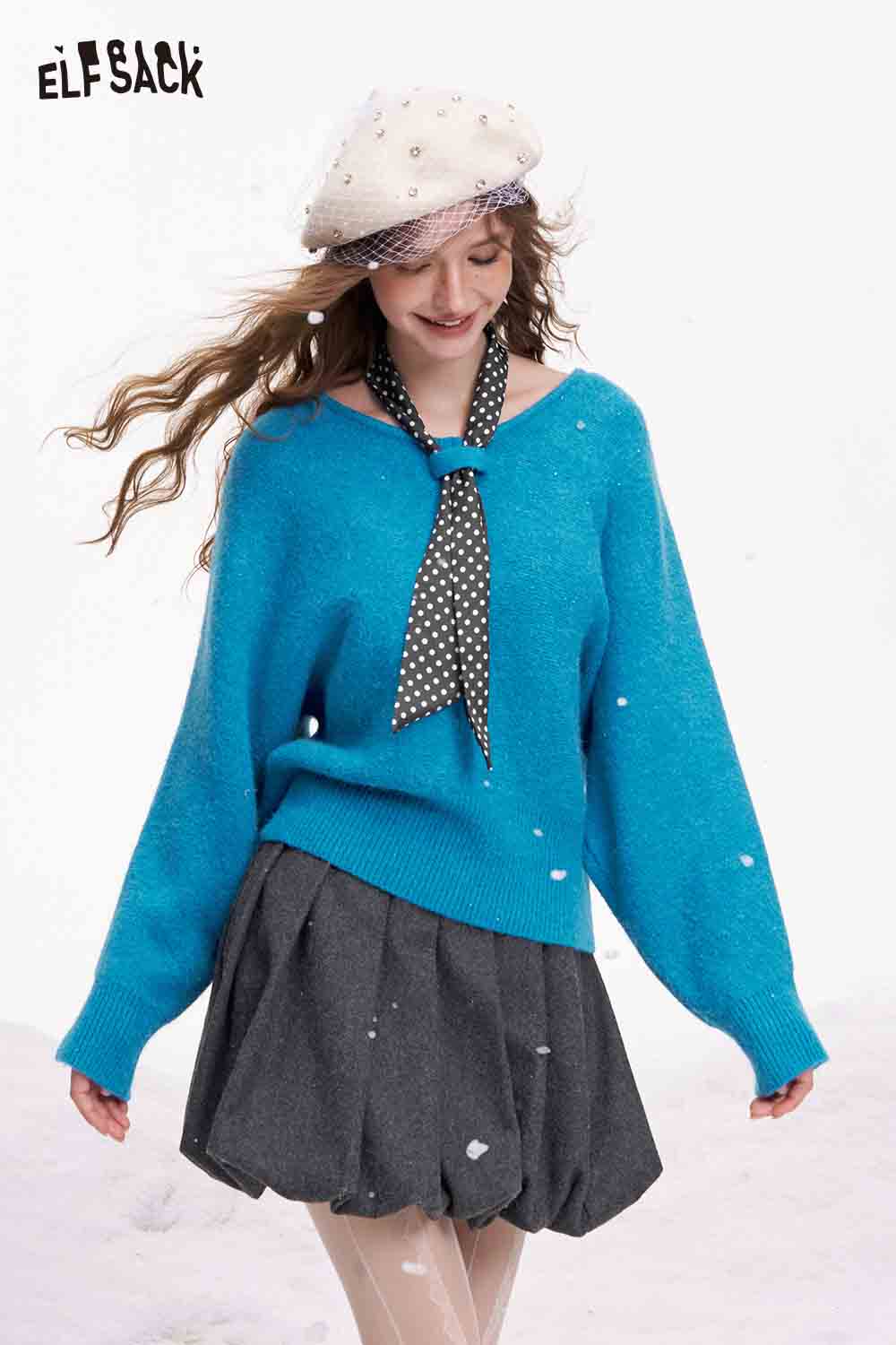 ELFSACK bat sleeve polka dot sweater in vibrant blue, styled with a black polka dot scarf and skirt