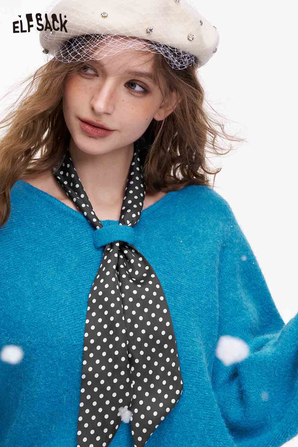 ELFSACK bat sleeve polka dot sweater in vibrant blue, styled with a black polka dot scarf