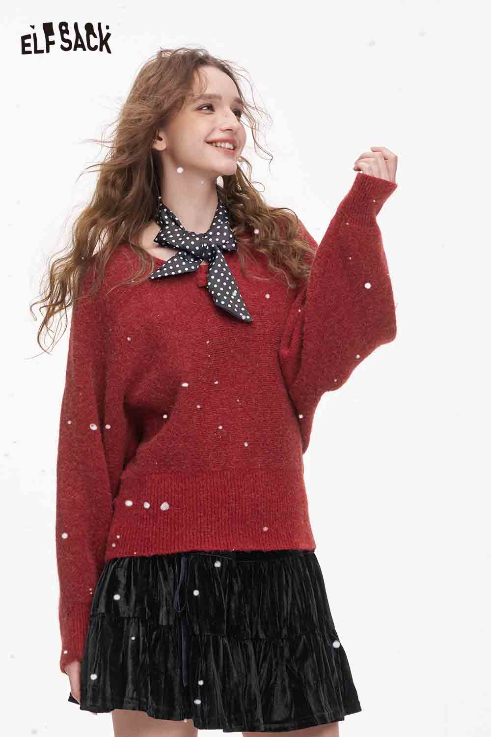 ELFSACK bat sleeve polka dot sweater in red paired with a stylish black skirt for a trendy look