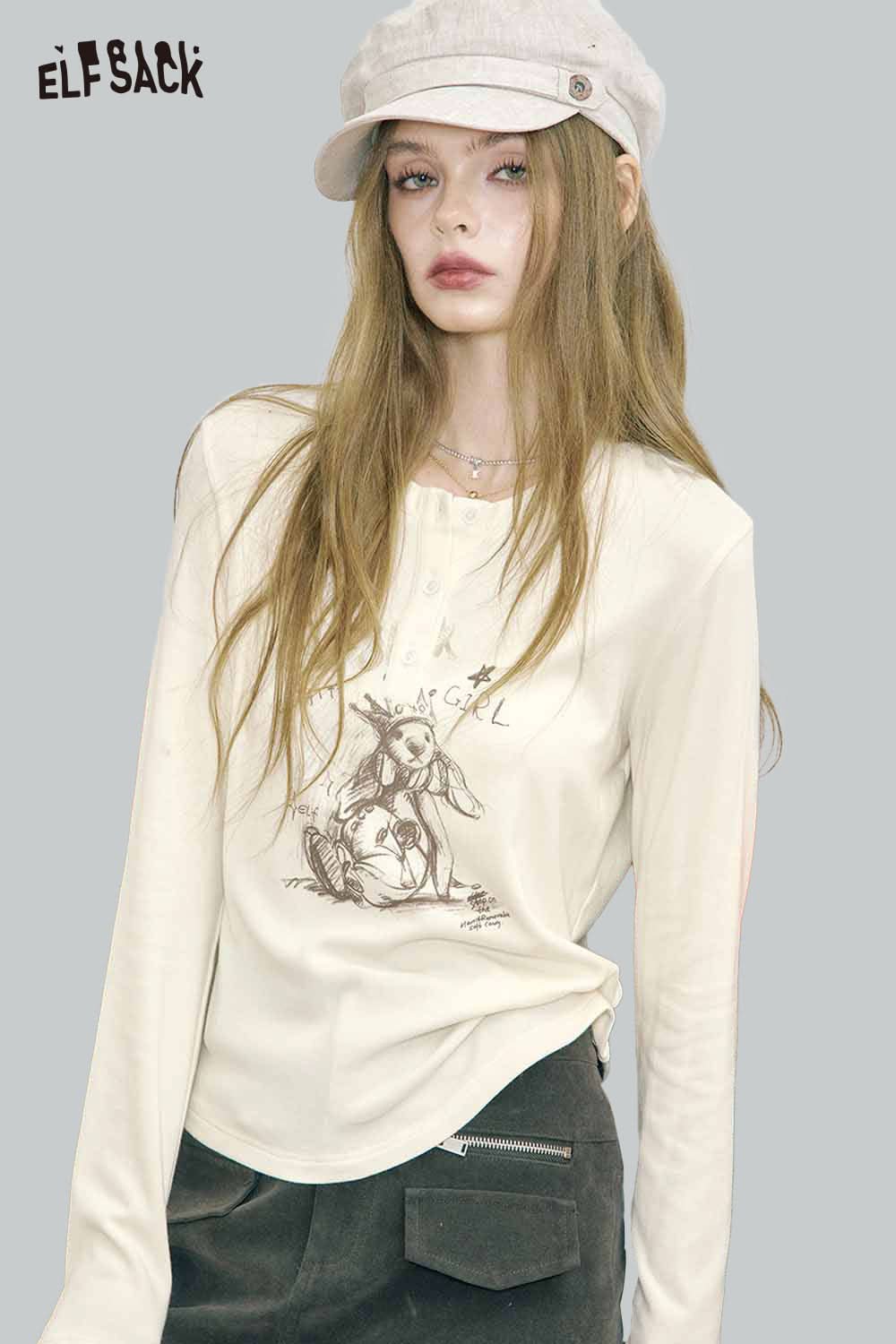 ELFSACK bear graphic relaxed fit tee in cream color with long sleeves and stylish design