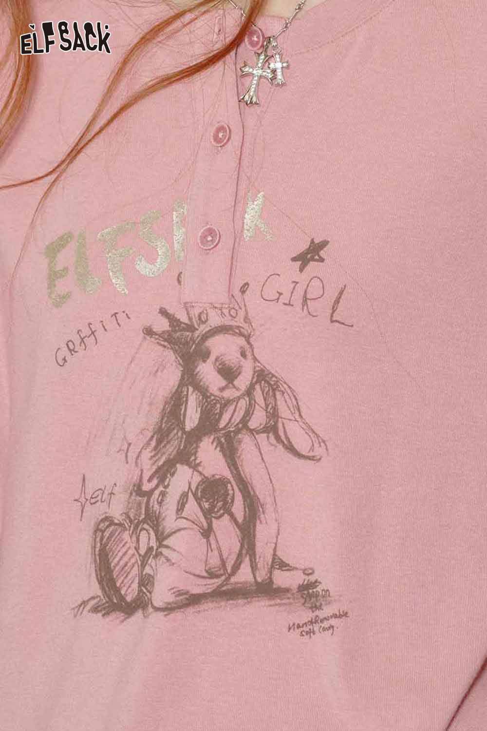 Pink ELFSACK bear graphic relaxed fit tee featuring playful artwork and soft fabric for casual wear