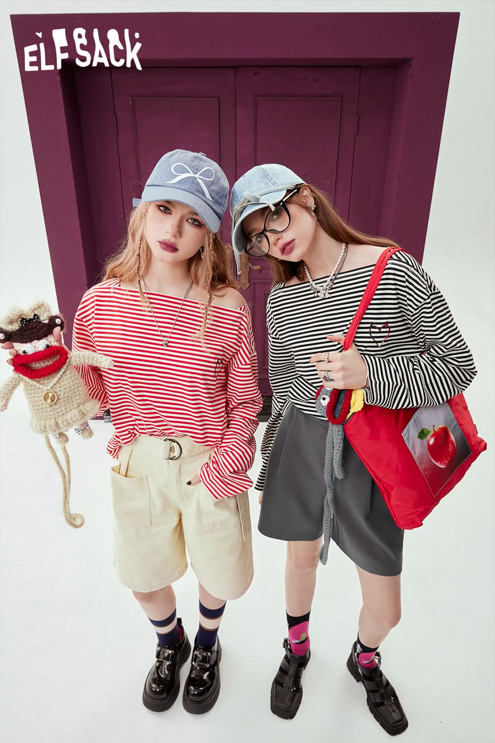 ELFSACK Black & White Striped long sleeve t-shirt worn by model with glasses and red shoulder bag