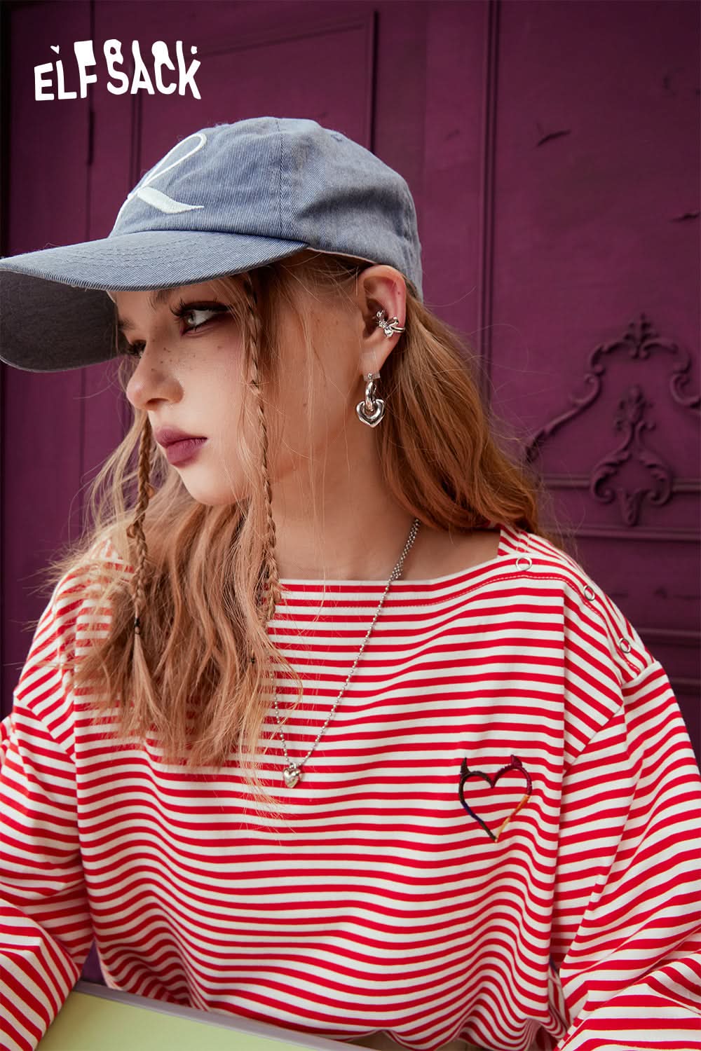 ELFSACK Black & White Striped T-shirt with heart embroidery worn by woman with gray cap