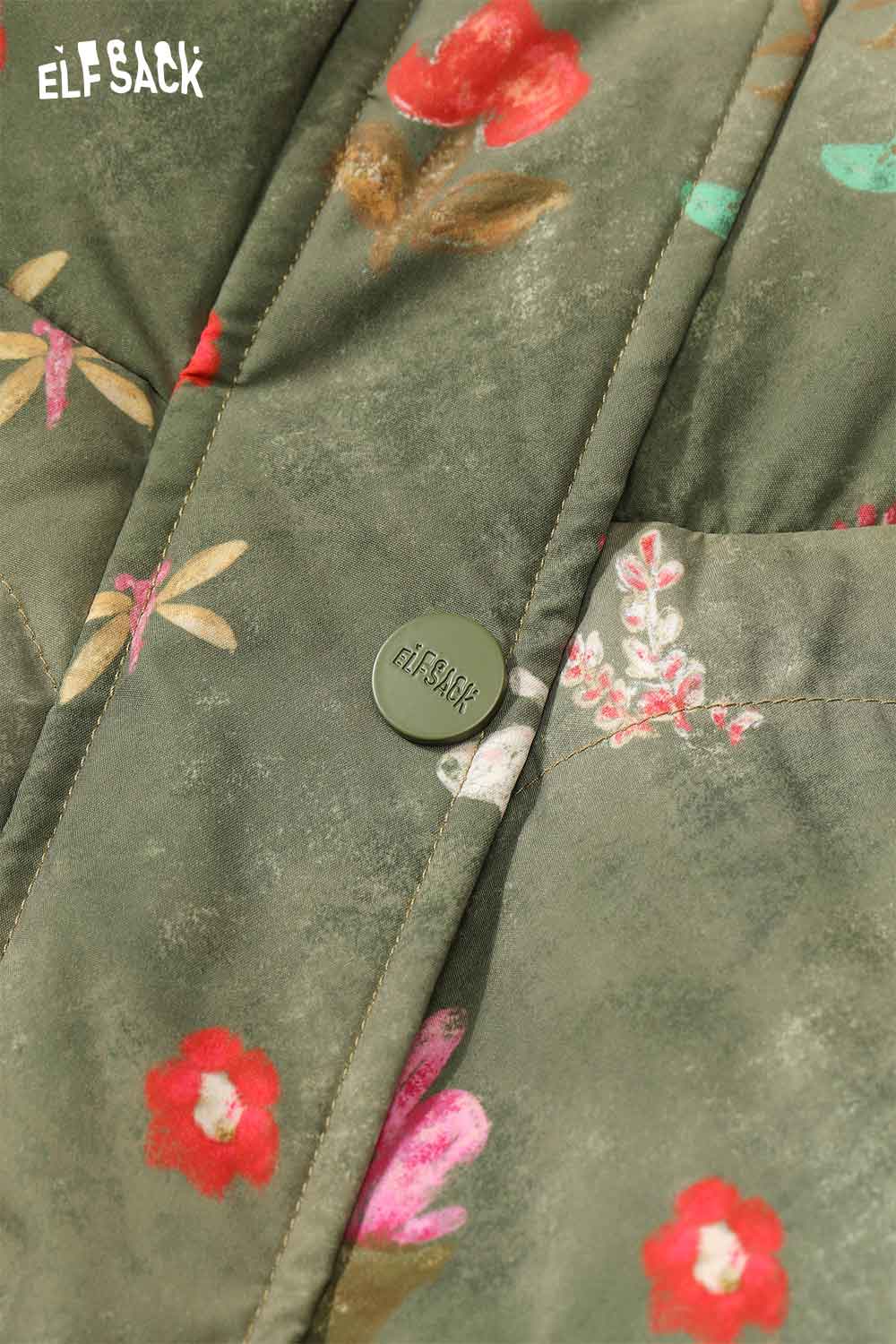 Bohemian floral reversible vest by ELFSACK featuring a colorful floral pattern against a green background