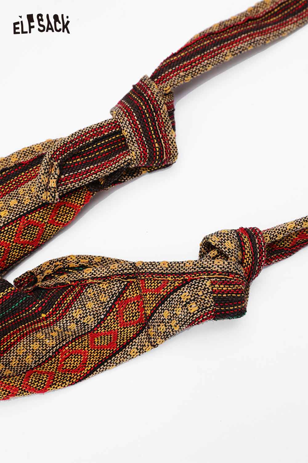 Close-up of ELFSACK bohemian macrame tote bag straps with colorful woven patterns
