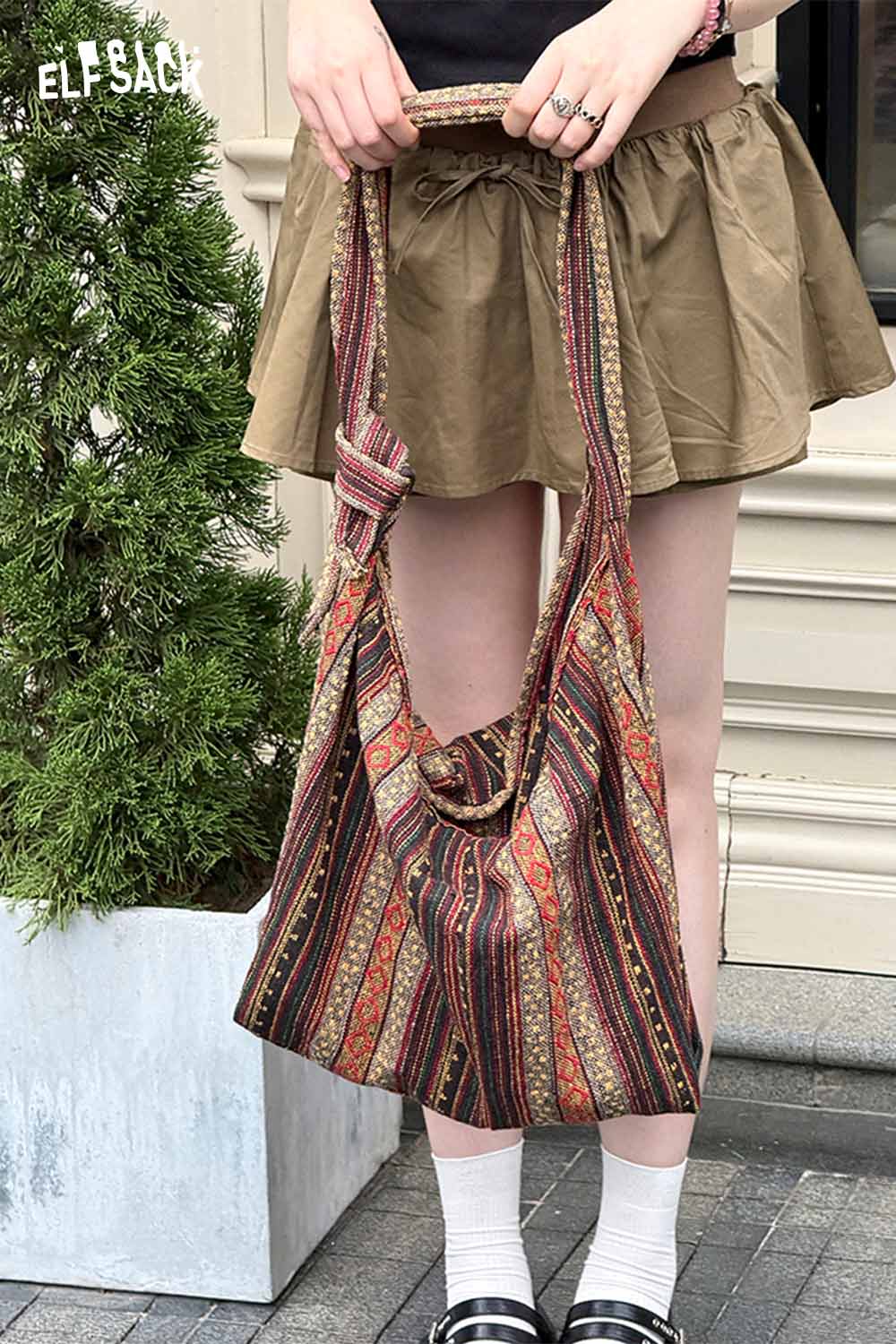 ELFSACK bohemian macrame tote bag with colorful patterns and a comfortable strap, perfect for casual outings