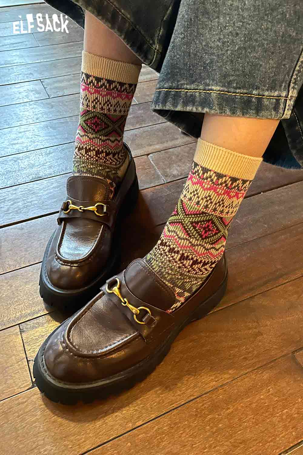 ELFSACK bohemian stripe socks for women paired with stylish loafers on wooden floor