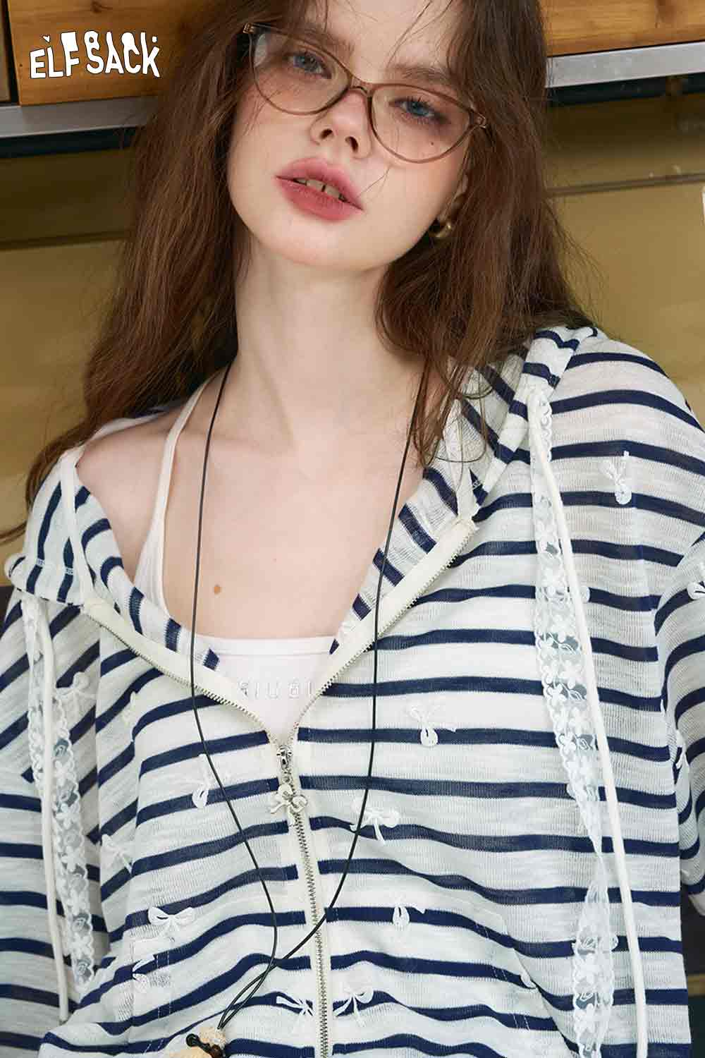 ELFSACK oversized striped cardigan for women navy and white zip hoodie with lace trim layered over white camisole
