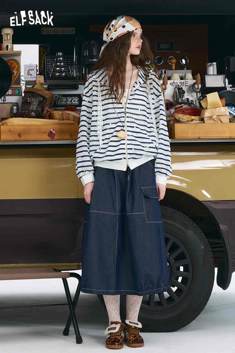 ELFSACK model wearing oversized striped cardigan for women with denim midi skirt beret and loafers