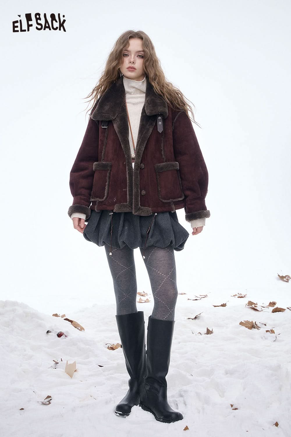 Woman wearing stylish ELFSACK breathable mesh leggings for women with a cozy jacket and skirt