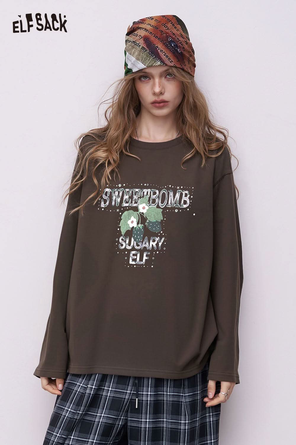 ELFSACK oversized daisy graphic tee for women brown long sleeve relaxed fit with daisy print and vintage text