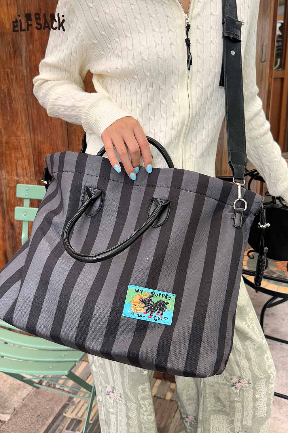 ELFSACK canvas stripe tote bag featuring a stylish black and gray striped design and adjustable straps