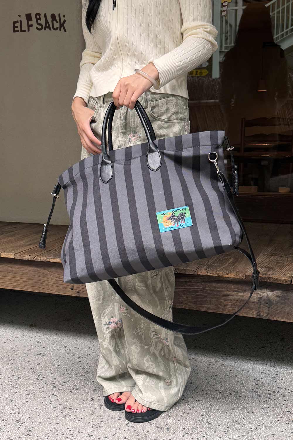 ELFSACK canvas stripe tote bag with black handles and colorful patch for stylish everyday use