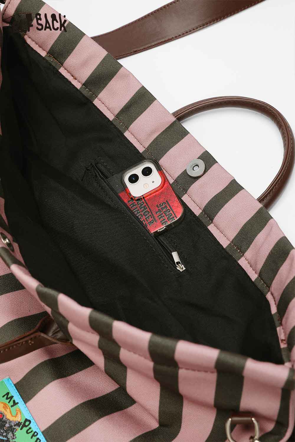 Inside view of ELFSACK canvas stripe tote bag featuring a zip pocket and brown straps
