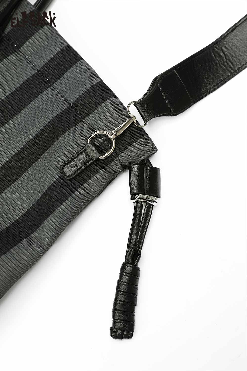 Close-up of ELFSACK canvas stripe tote bag showing straps and metal hardware details