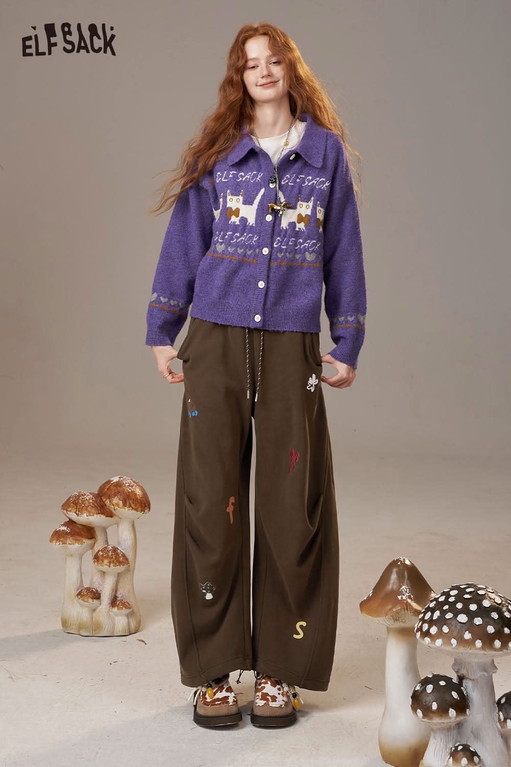 ELFSACK cartoon embroidery sweatpants for women in a relaxed fit paired with a stylish sweater