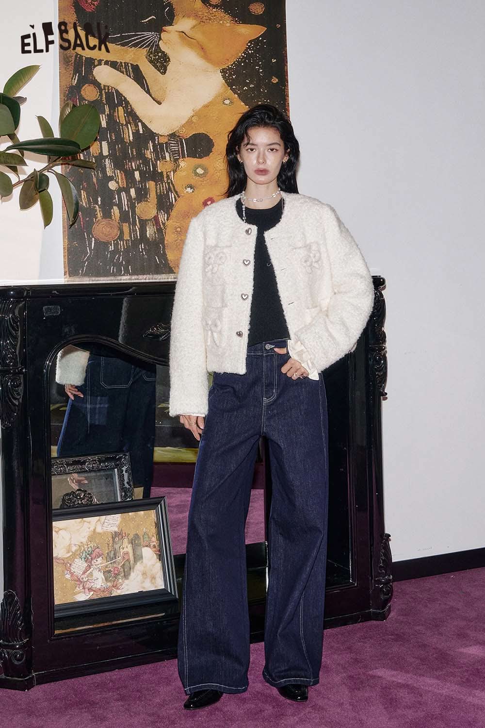 ELFSACK cashmere blend slim fit knit top styled with wide-leg jeans in a chic indoor setting