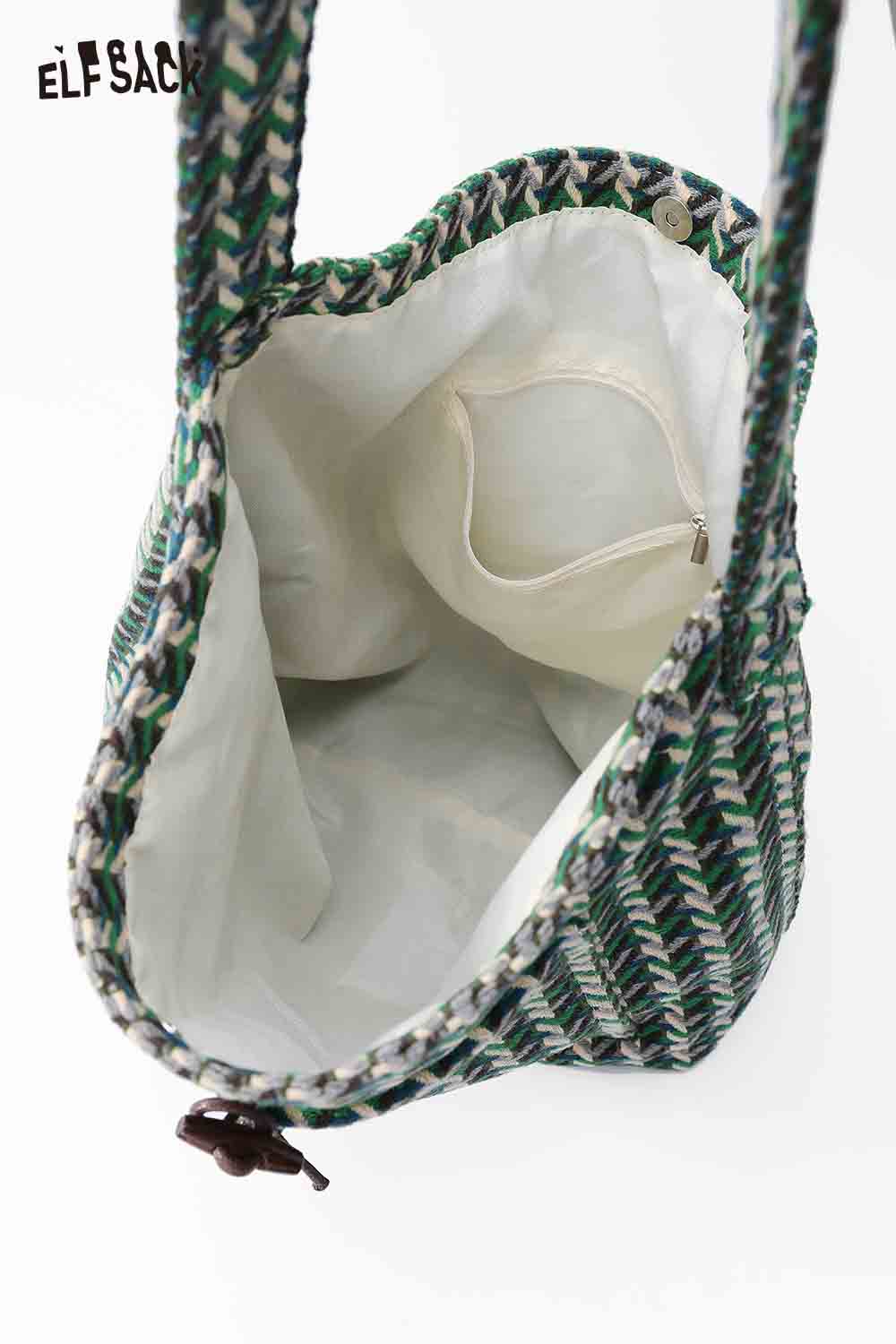 Spacious ELFSACK casual striped crossbody bag with interior pocket for easy organization