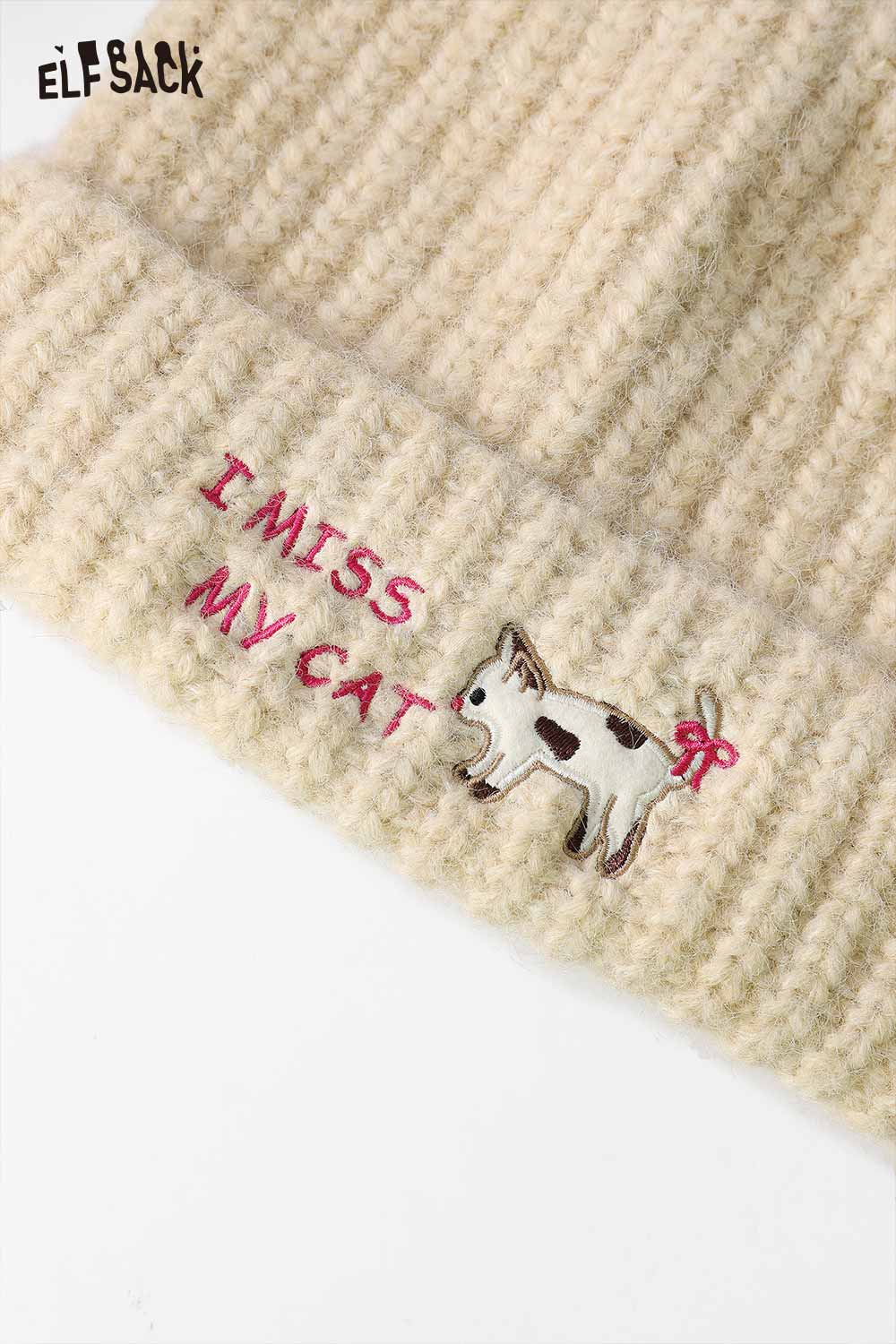 ELFSACK cat ear beanie for women featuring 'I Miss My Cat' embroidered design in cream color