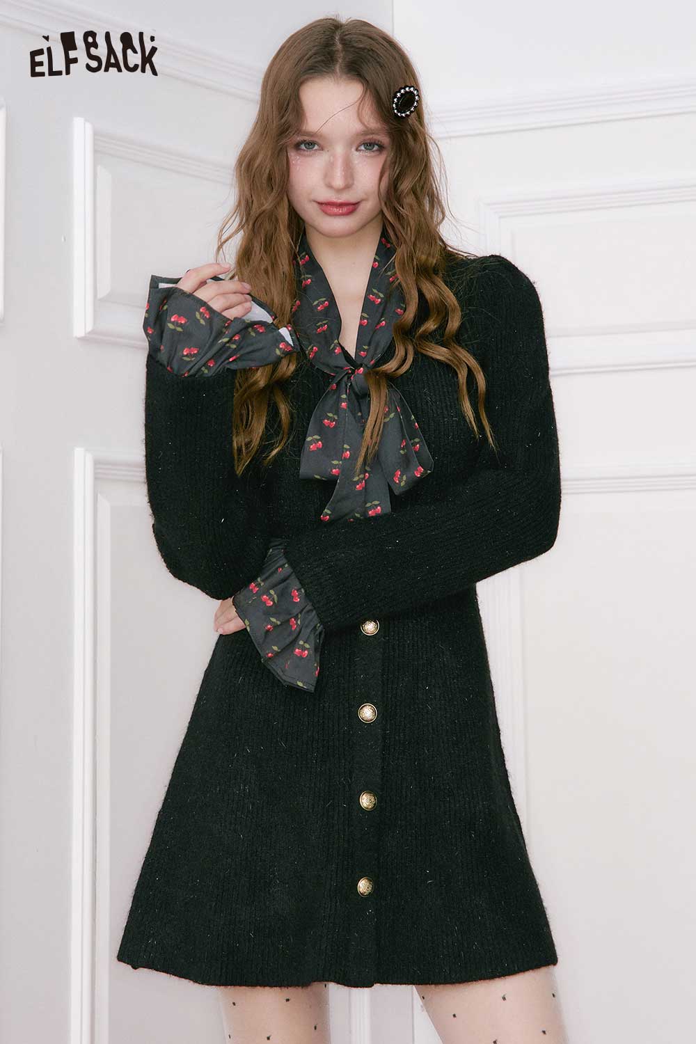 ELFSACK cherry graphic bow tie dress featuring a black knitted design and stylish button front