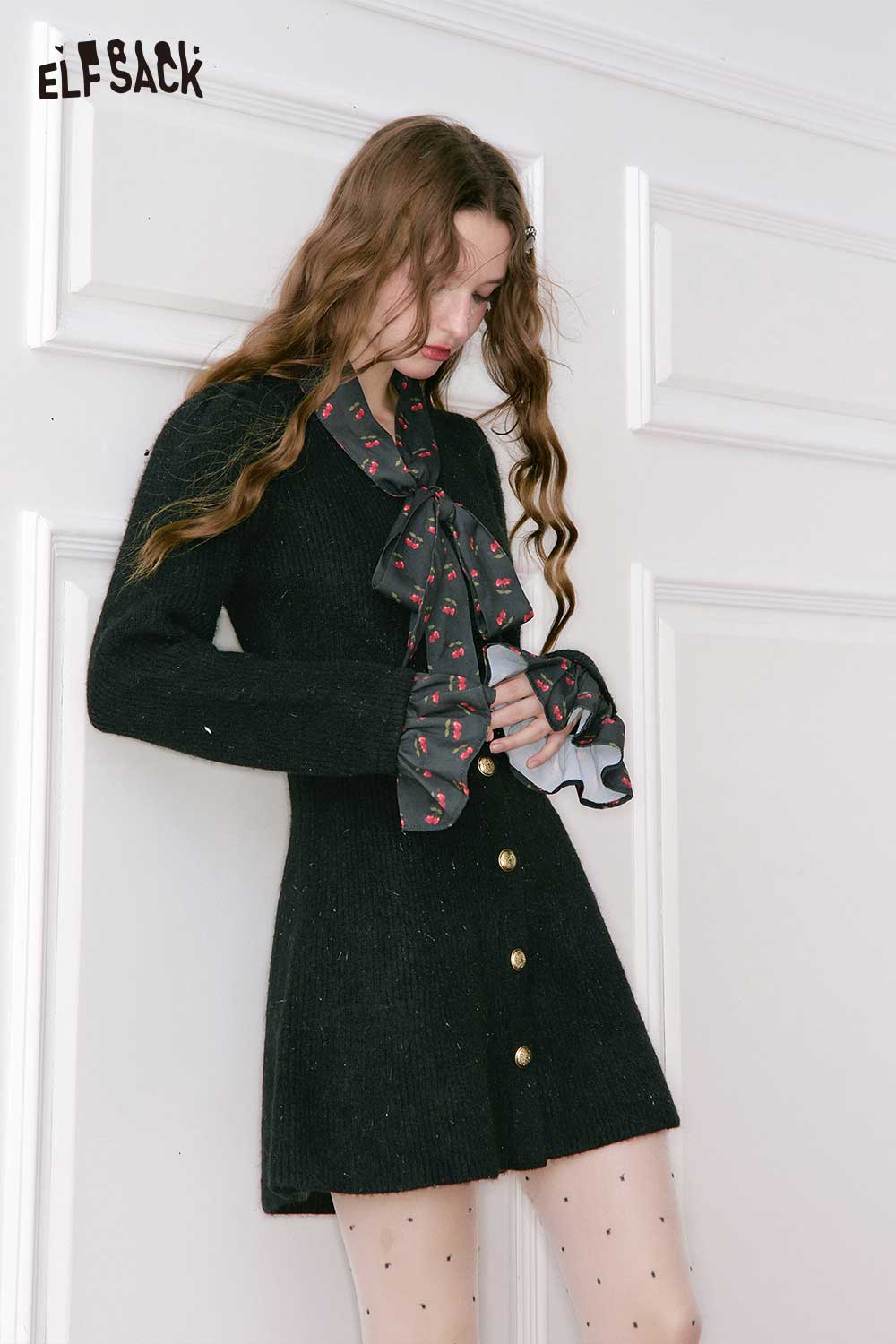 ELFSACK cherry graphic bow tie dress in black with stylish buttons and ruffled sleeves