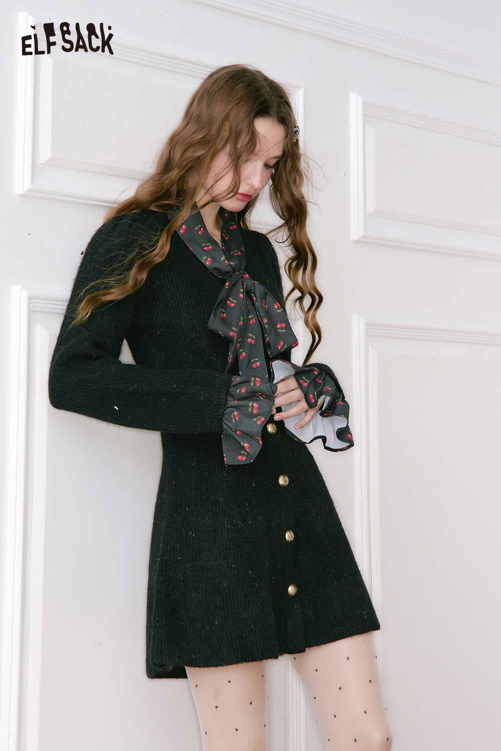 ELFSACK cherry graphic bow tie dress in black with stylish buttons and ruffled sleeves