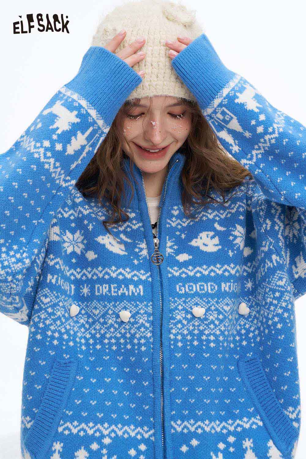 ELFSACK Christmas graphic reversible sweater in blue with festive patterns and pom poms