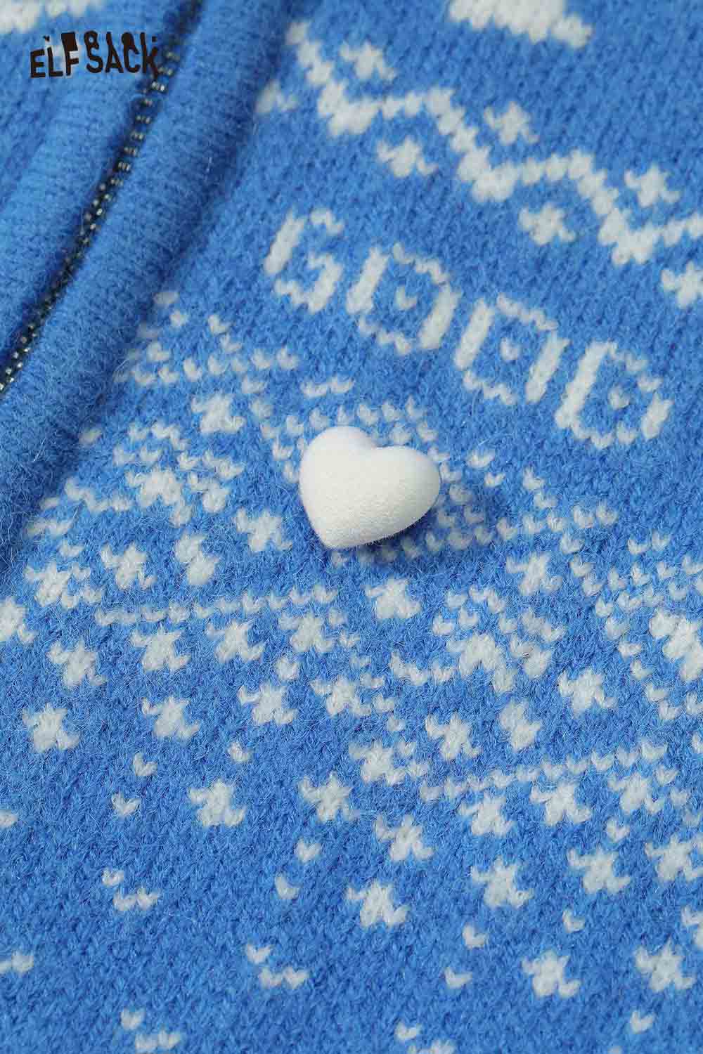 ELFSACK Christmas graphic reversible sweater in blue with white festive designs and heart detail