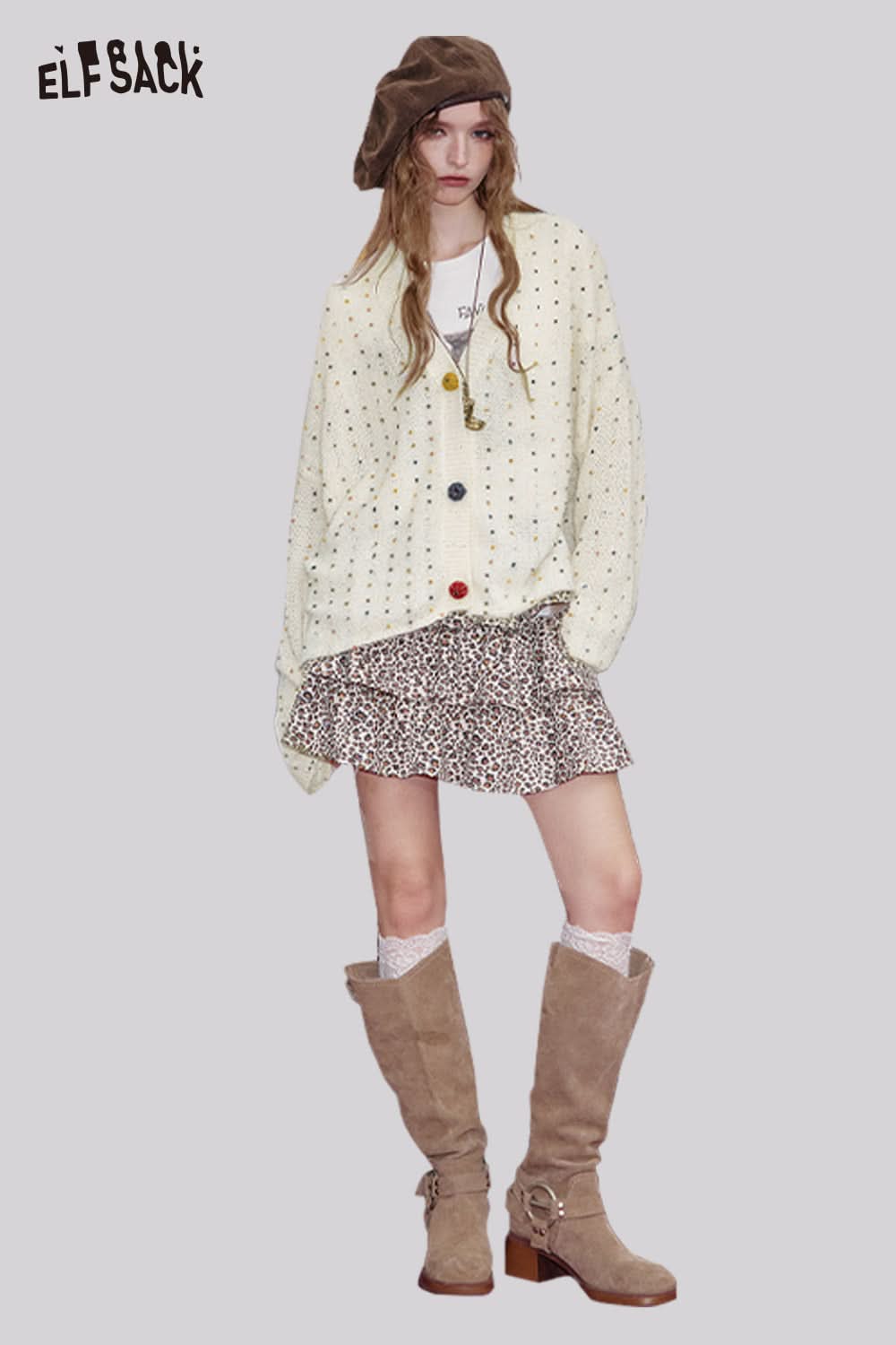 ELFSACK chunky v-neck cardigan for women paired with a leopard print skirt and knee-high boots