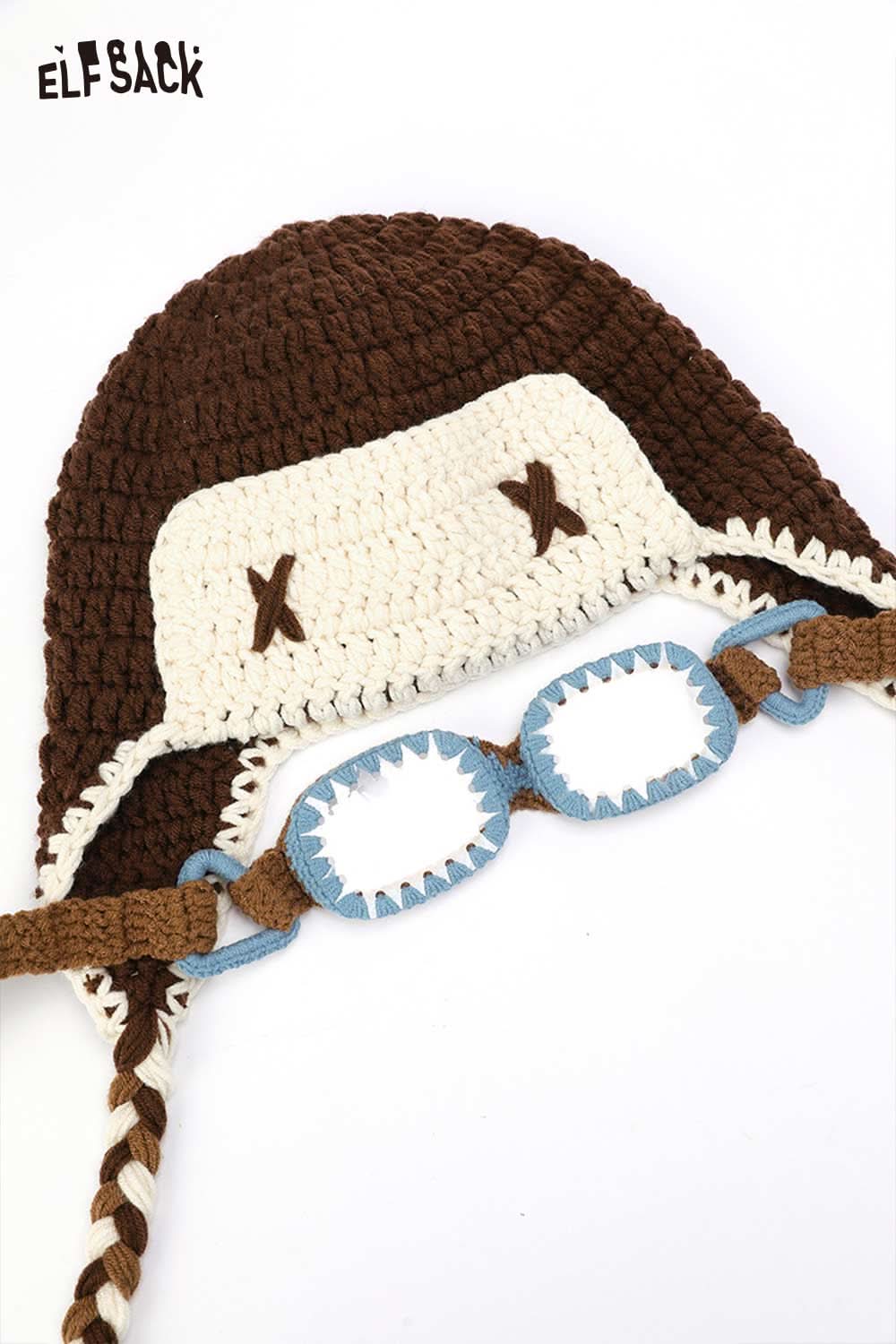 ELFSACK color blocked crocheted ear flap beanie with playful design and attached goggles