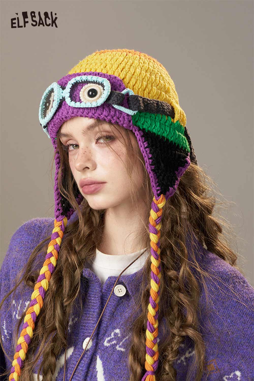 ELFSACK color blocked crocheted ear flap beanie with playful design and vibrant color scheme