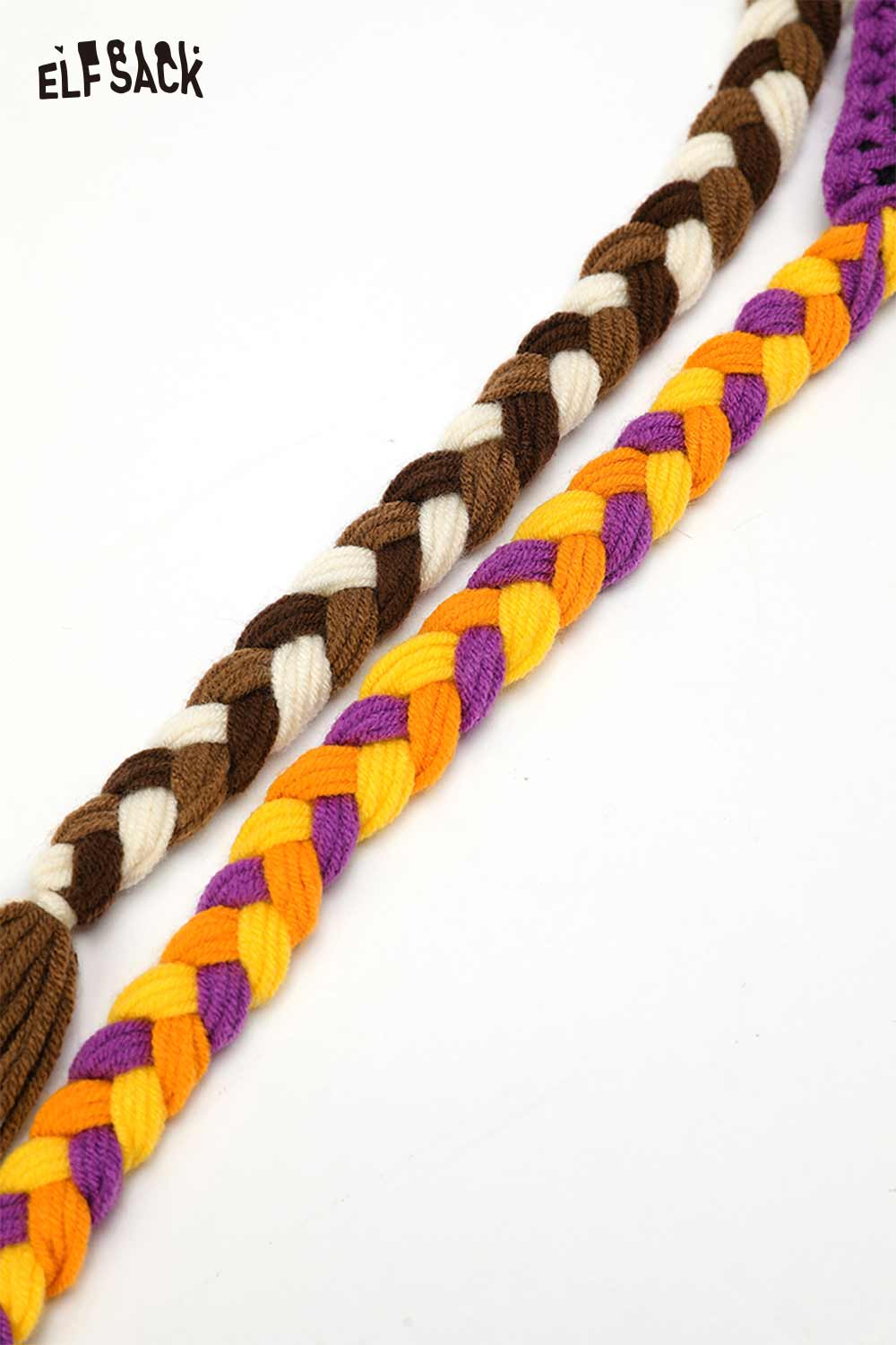 Color blocked crocheted ear flap beanie with braided details in brown, orange, yellow, and purple hues