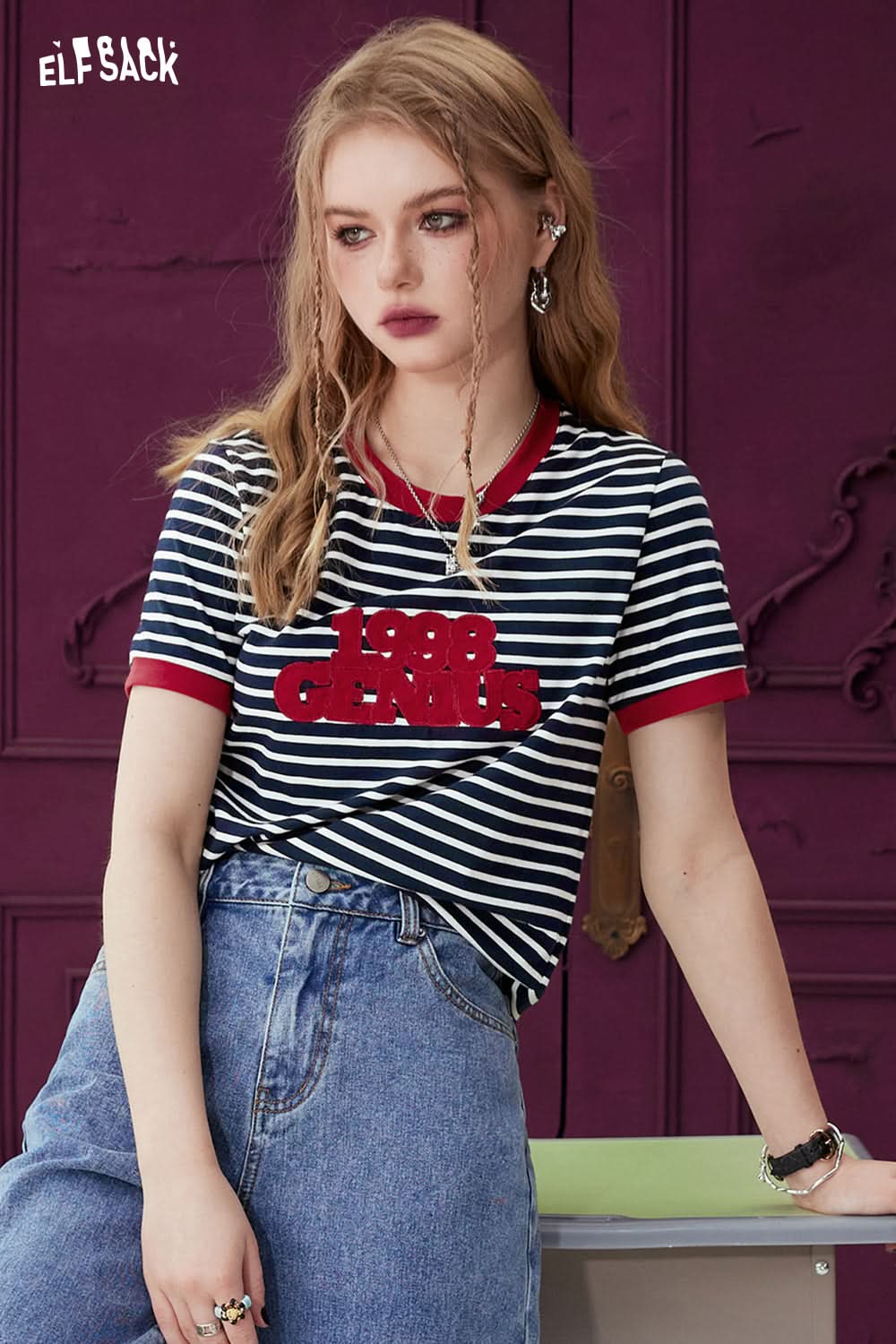 ELFSACK T-shirt with Contrasting Stripe pattern in navy and white with red accents and graphic text