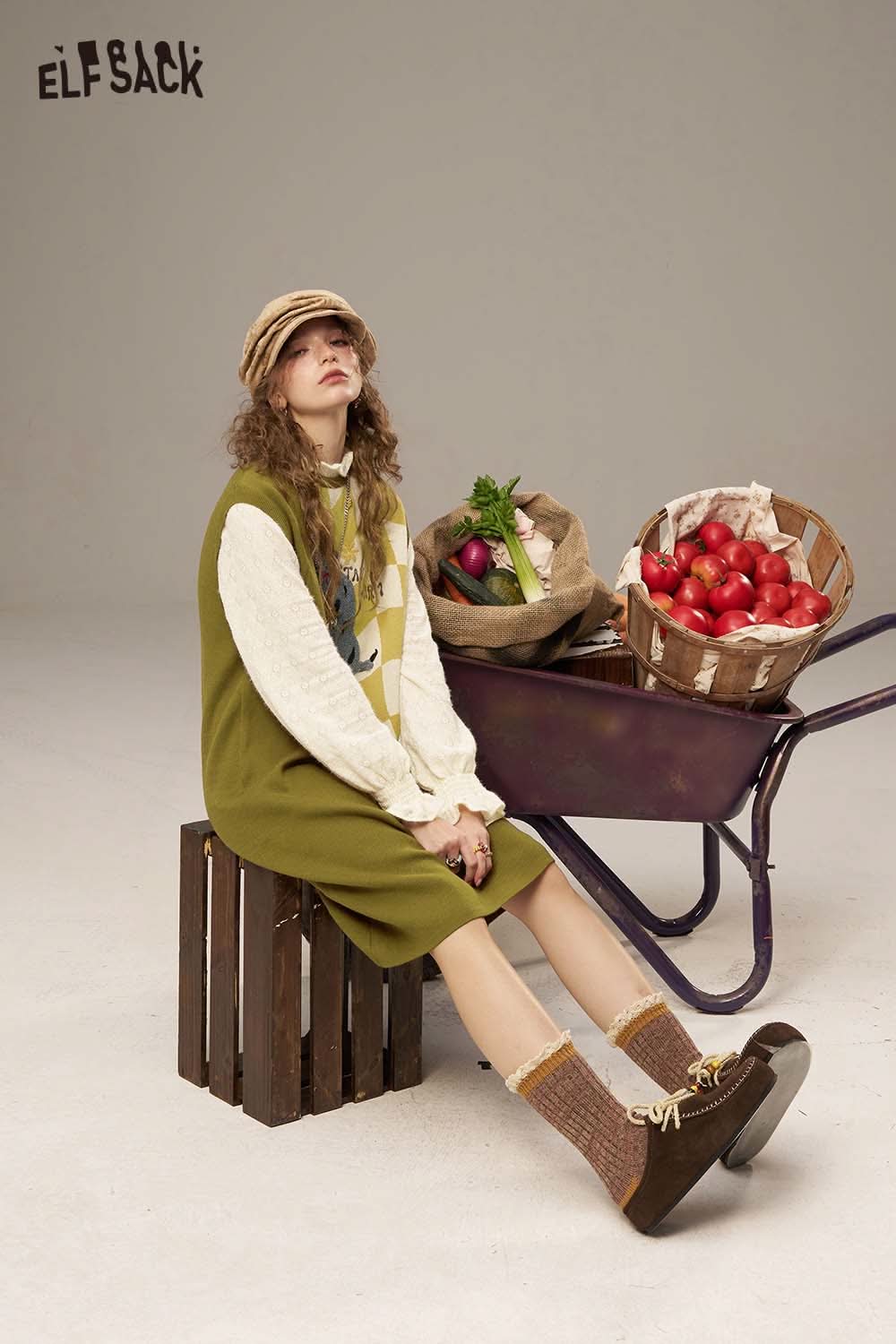 ELFSACK canine motif embroidered dress styled with a cozy sweater and cute accessories