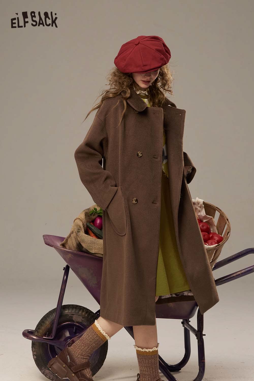 ELFSACK canine motif embroidered dress paired with a stylish overcoat for a chic autumn look
