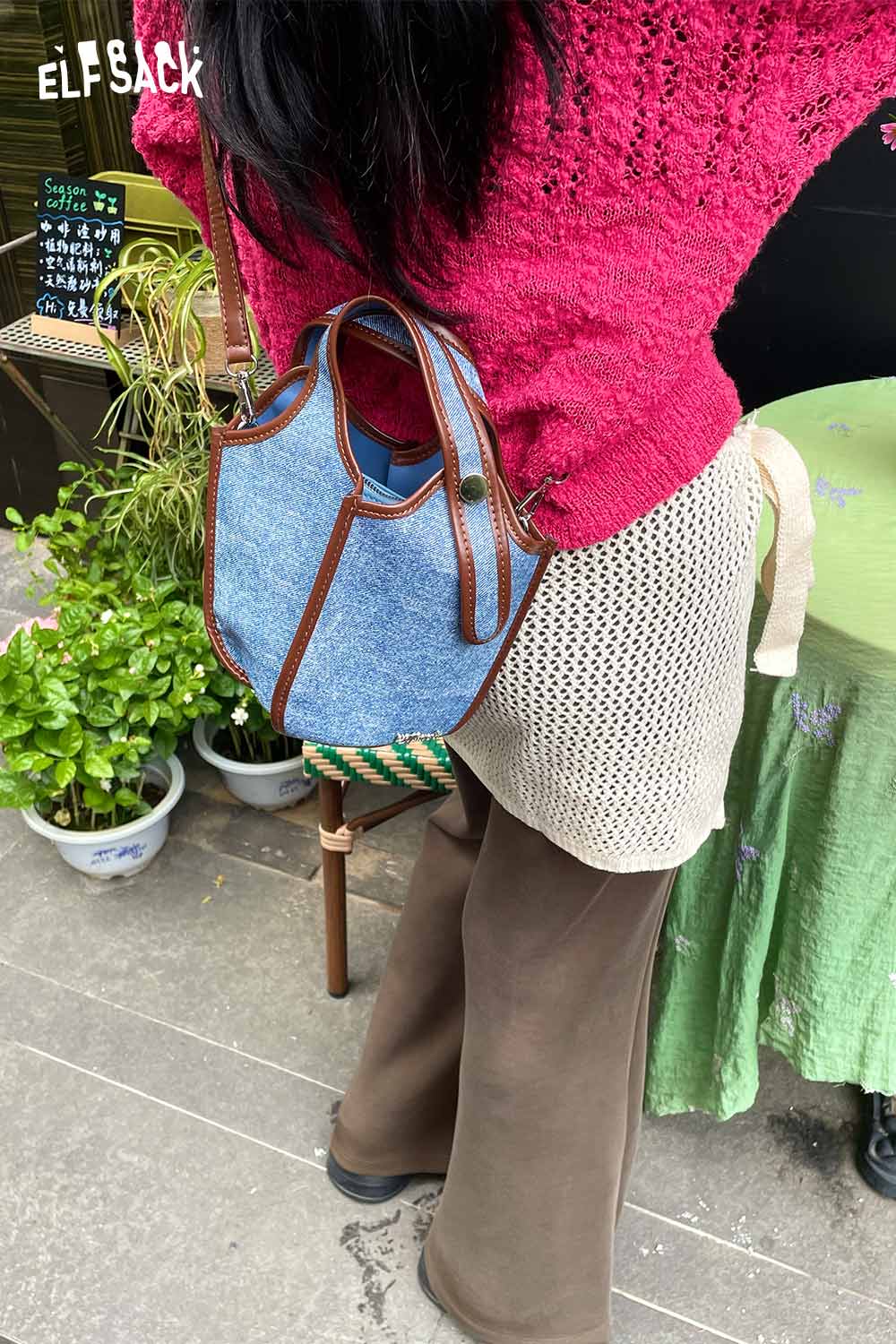 Stylish woman in a pink sweater with a cotton blend knit skirt with apron, paired with trendy accessories